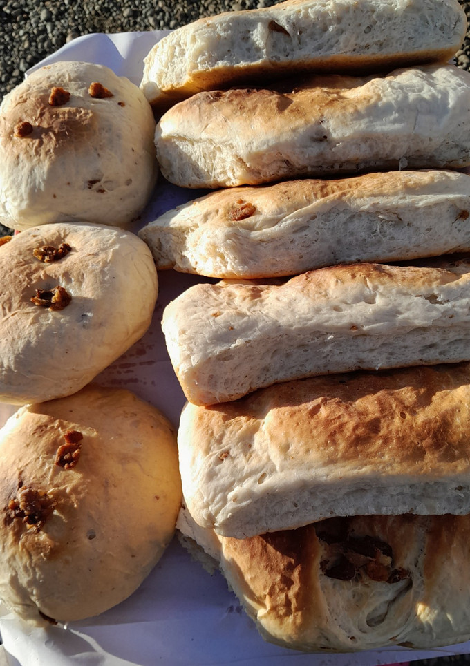 Una foto de Pan Casero con Chicharrón y Sin