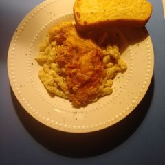 A picture of Crispy chicken cacciatore with pasta alfredo.