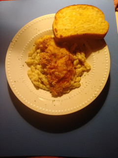 A picture of Crispy chicken cacciatore with pasta alfredo.