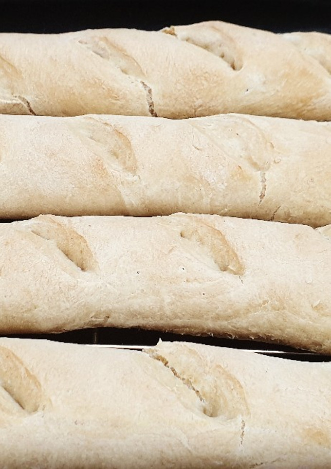 Una foto de Baguetines de pan francés
