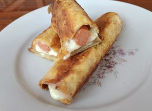Una foto de Deliciosos Rollitos de salchicha y queso😋🙌