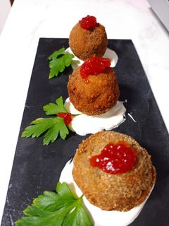 Una foto de Champiñones rellenos rebozados