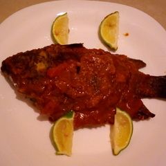 A picture of Wet fried fish with gravy.