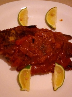 A picture of Wet fried fish with gravy.