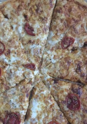 A picture of Homemade Extra Cheese Pizza.