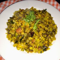 A picture of Cauliflower leaves and lentil fry.