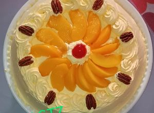 Una foto de Pastel tres leches Durazno y Nuez