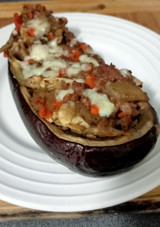 Una foto de 🍆 Berenjenas rellenas de salsa boloñesa 🥩