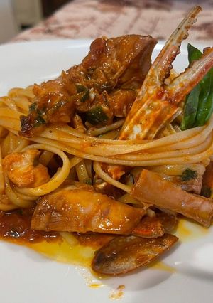 Foto di Linguine con Tentacoli di Polpo e Granchio al Sugo