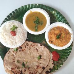 A picture of Restaurant-Style Punjabi Thali.