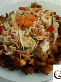 A picture of Coleslaw with FRIED diced plantain.
