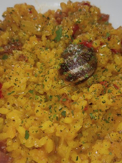 Una foto de Arroz con caracoles