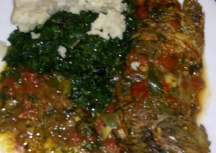 Stewed fish with greens and ugali
