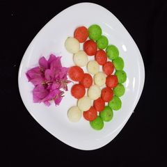 A picture of Mini tri colour idli.