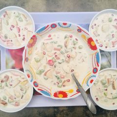 A picture of Creamy fruit chaat with Cocktail.