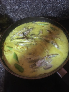 A picture of Ginataang Isda w Tumeric sauce or Fish w Coconut Cream w Tumeric sauce.