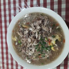 A picture of Chicken corn soup.