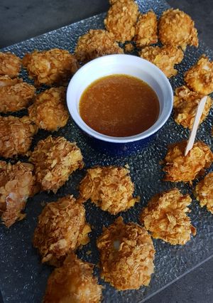 Une photo de Nuggets de poulet corn flakes sauce abricot