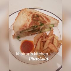 A picture of Bread Omelette and chips.