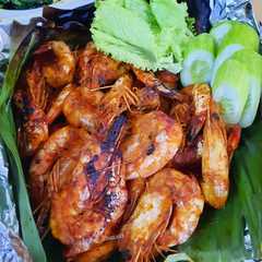A picture of Udang panggang bumbu kari.