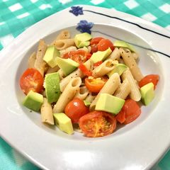 A picture of Aglio olio with Avocado and Cherry Tomatoes.