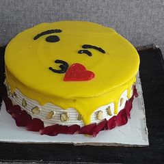 A picture of Emoji Rasmalai Cake.