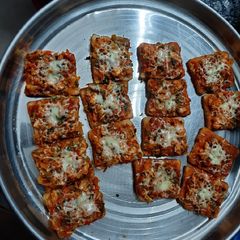 A picture of Chicken bread pizza.