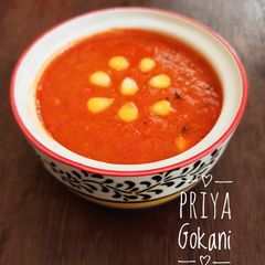 A picture of Desi Gajar (Red carrots) sweet corn curry.