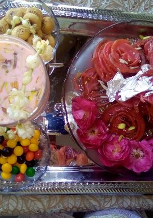 A picture of Pink jalebi with pinkish drink💕.