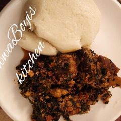 A picture of Semovita with egusi and water leaf soup.