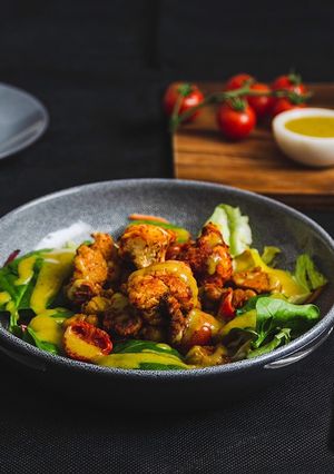 A picture of Spicy, Roasted Cauliflower_Tomato Salad.
