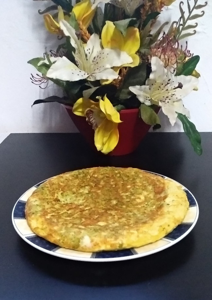 Una foto de Tortilla de brócoli rellena de queso