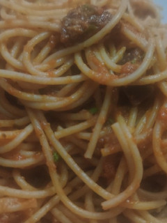 Una foto de Espaguetis integrales con salsa de tomate y ricota