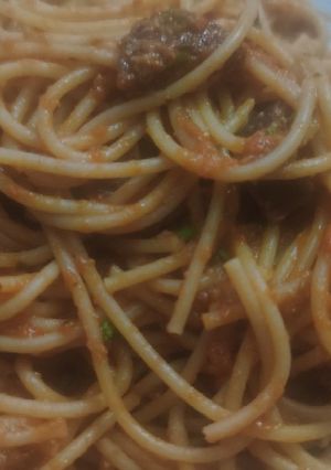 Una foto de Espaguetis integrales con salsa de tomate y ricota