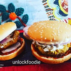 A picture of Aloo tikki Burger 🍔 with deshi tadka.