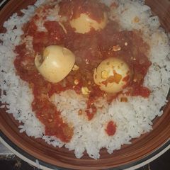 Title: Some good ol' Rice and egg curry A picture of Title: Some good ol' Rice and egg curry.