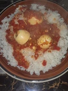 A picture of Title: Some good ol' Rice and egg curry.