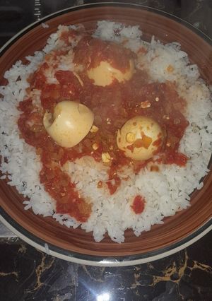 A picture of Title: Some good ol' Rice and egg curry.
