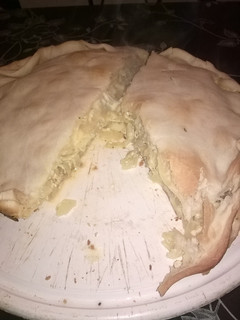 Una foto de Tarta de cebolla y queso