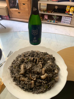 Una foto de Arroz Negro con Calamar
