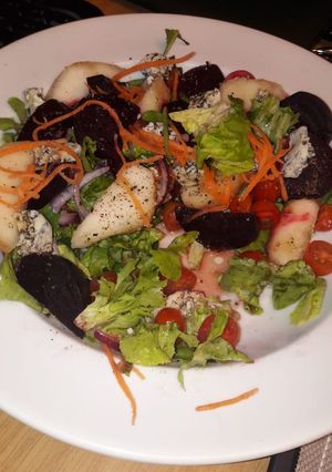 A picture of Blue cheese pear and beetroot salad.