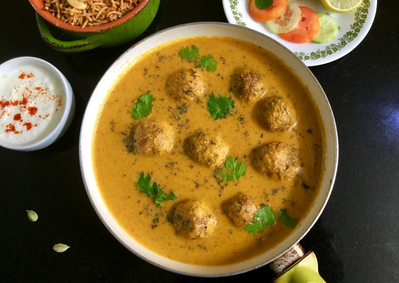 Gobhi Koftas in Carrot Sauce
