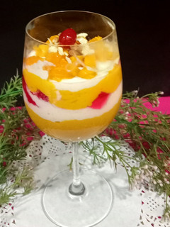 A picture of Alphonso Mango Cream, Rabdi, Jelly Layers Dessert.