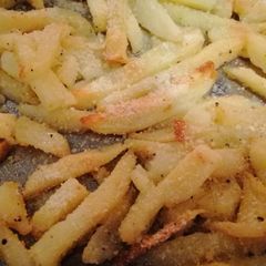 A picture of Parmesean dusted fries.