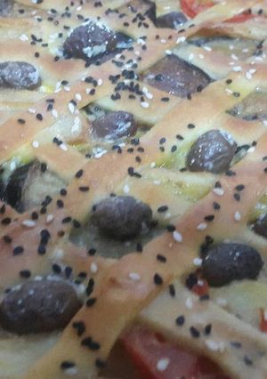 صورة لوصفة خبز مجدول مرصع بالزيتون