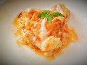 Una foto de migas de bacalao al horno