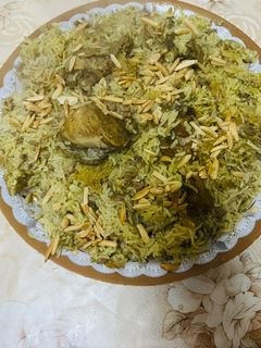 صورة لوصفة ارز مع اللحمه وقطع دجاج