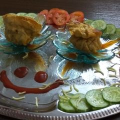 A picture of Pouch main dhamaka  with salad.