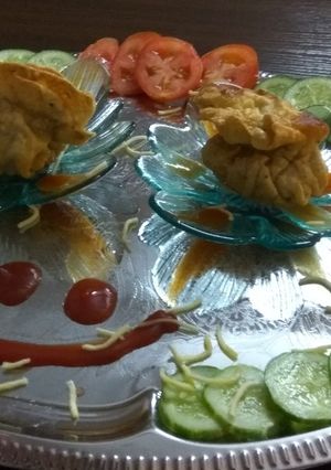 A picture of Pouch main dhamaka  with salad.