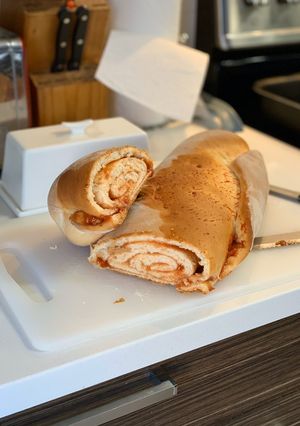 A picture of White bread with guava jelly (goiabada).